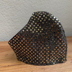 Gold polka dot face mask.